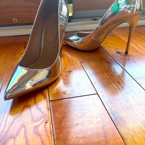 Aldo silver heels. Originally 80 dollars. Used. Good condition.